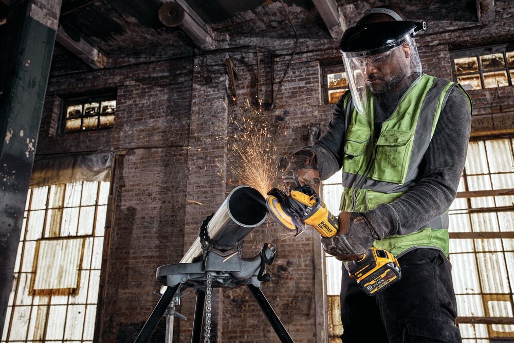 BRUSHLESS CORDLESS PADDLE SWITCH ANGLE GRINDER WITH FLEXVOLT ADVANTAGE in action